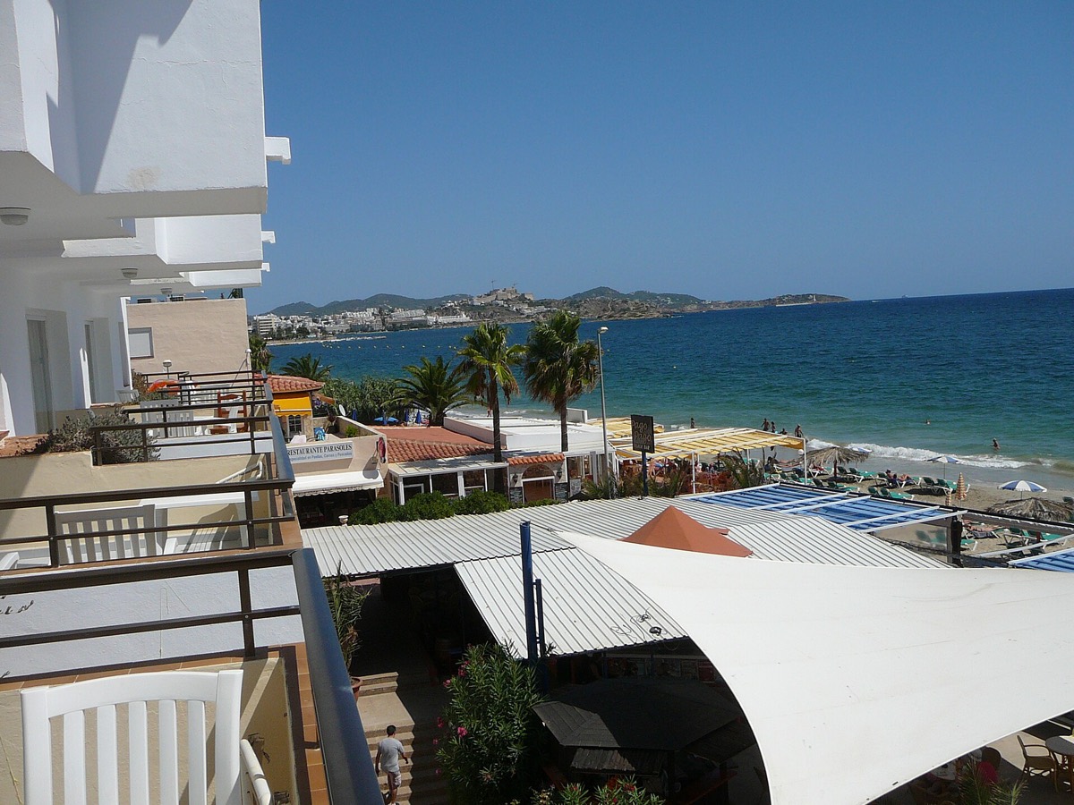 Playa d'en Bossa beach and turquoise water in Ibiza, Spain