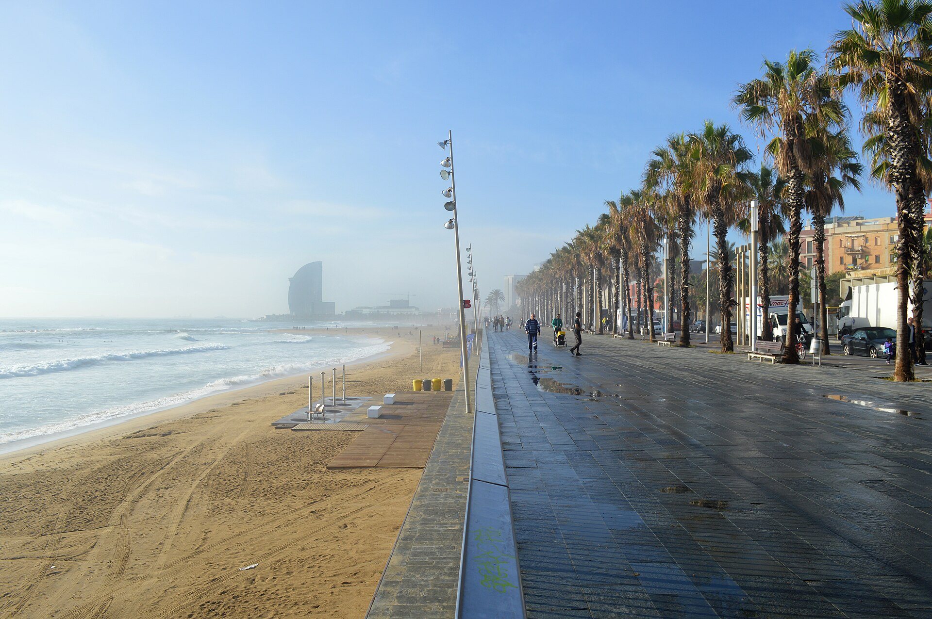 Promenade and sand at Platja de la Barceloneta, Barcelona